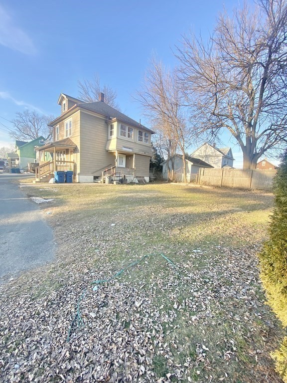56 Exposition Terrace West Springfield, MA 01089 - Photo 4 of 16 a view of a big yard next to a road