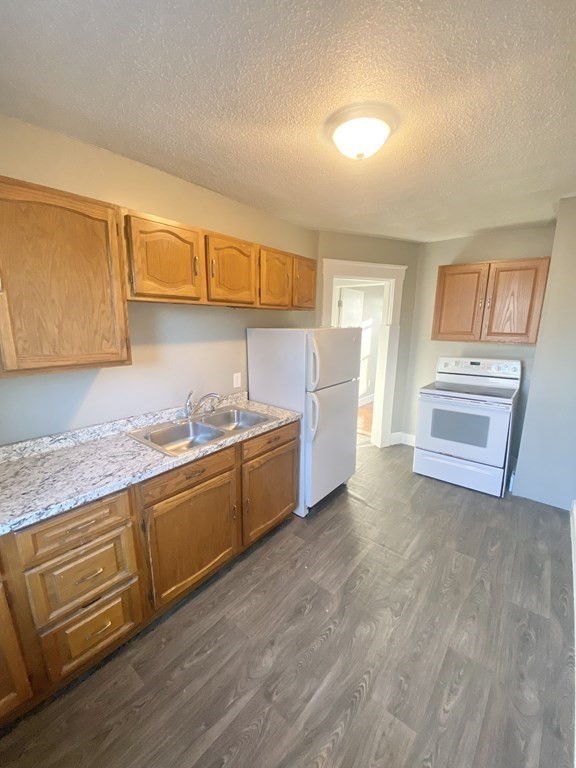 56 Exposition Terrace West Springfield, MA 01089 - Photo 6 of 16 a kitchen with stainless steel appliances granite countertop a sink and cabinets
