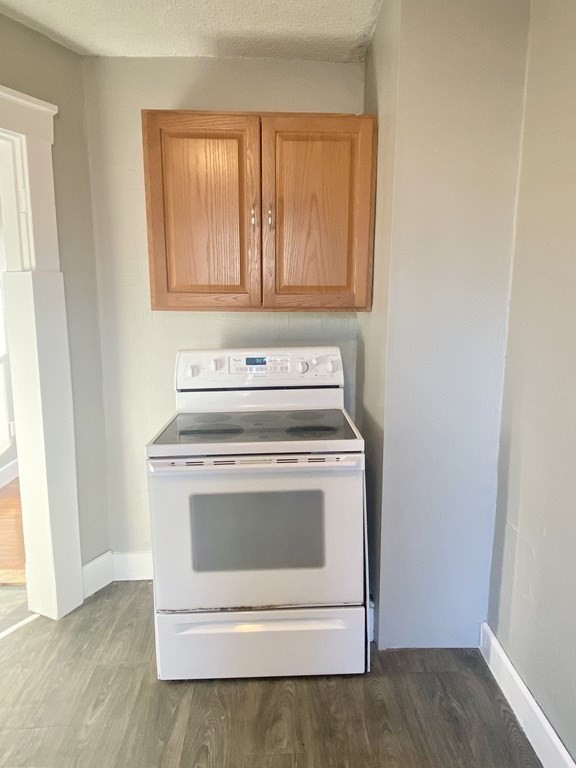 56 Exposition Terrace West Springfield, MA 01089 - Photo 7 of 16 a stove top oven sitting inside of a kitchen