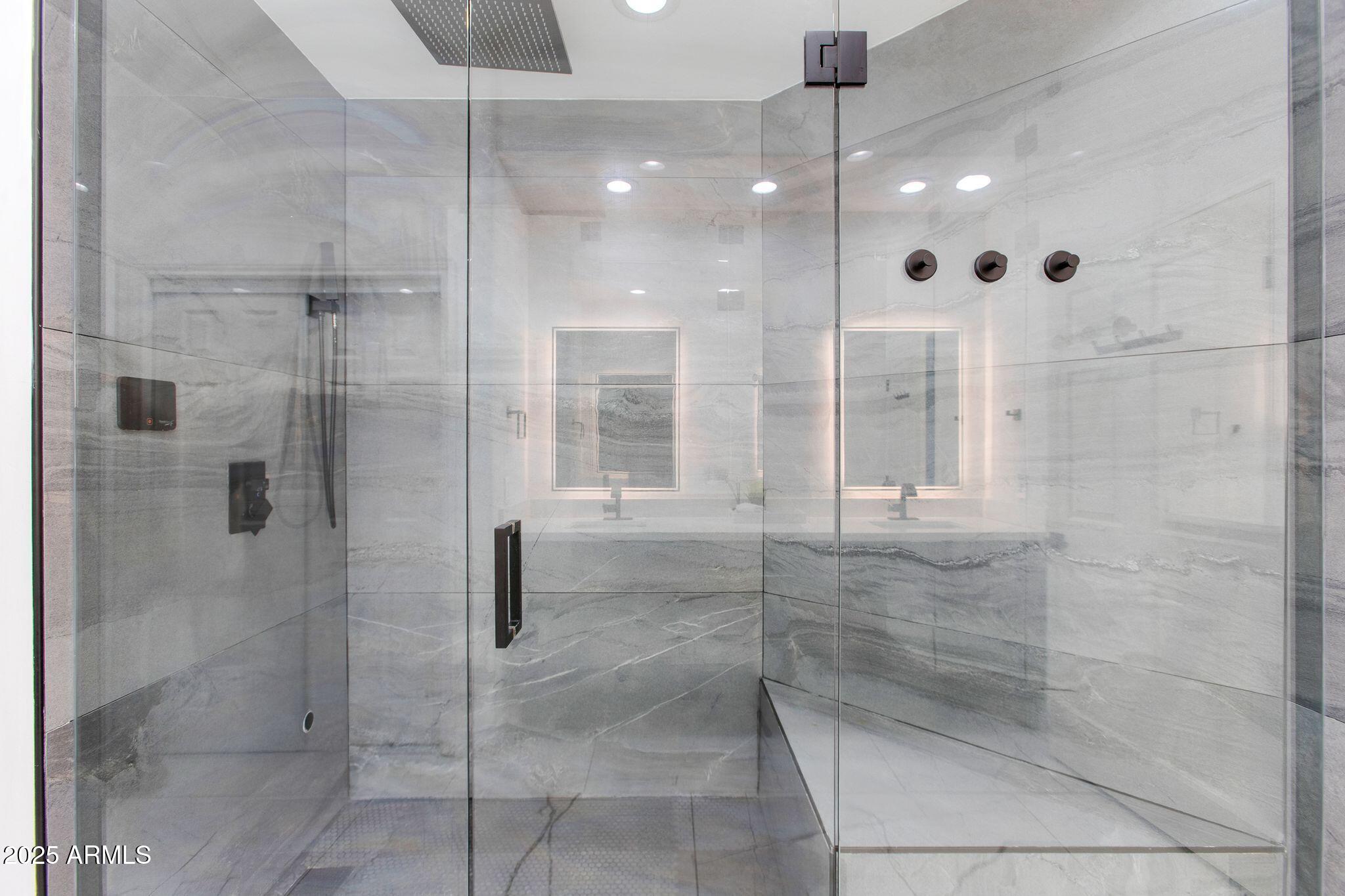 8245 East Bell Road, Unit 150 Scottsdale, AZ 85260 - Photo 7 of 12 a bathroom with a shower