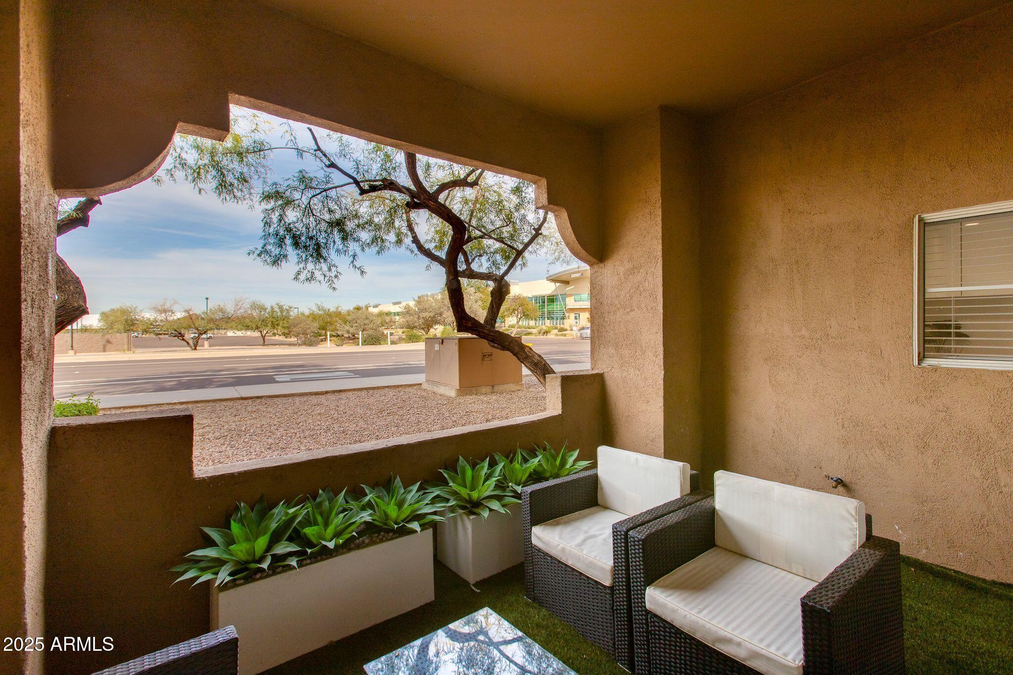 8245 East Bell Road, Unit 150 Scottsdale, AZ 85260 - Photo 10 of 12 a view of a outdoor seating