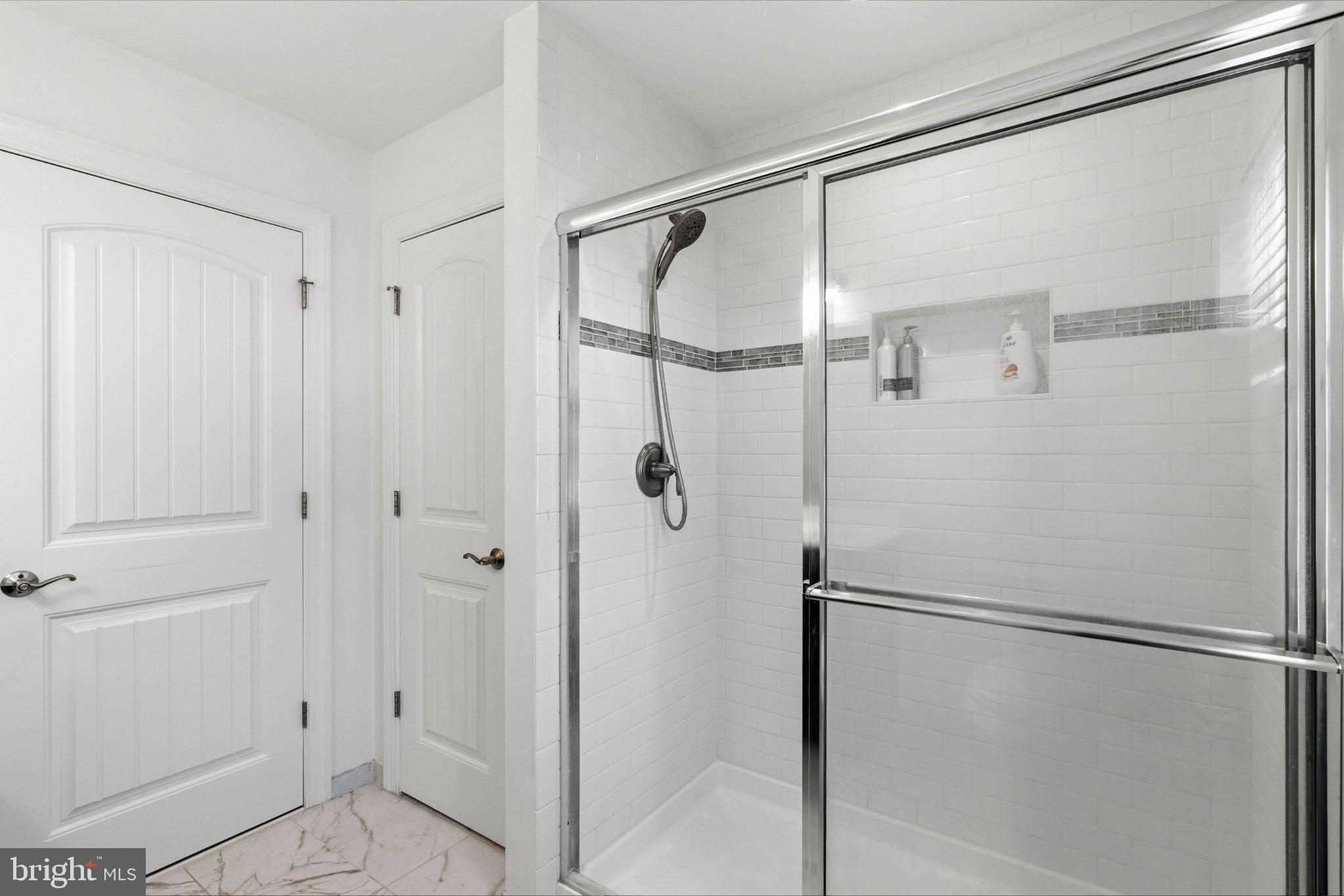 41 Spring Mill Drive Warminster, PA 18974 - Photo 29 of 45 Sleek modern shower with elegant tiles.
