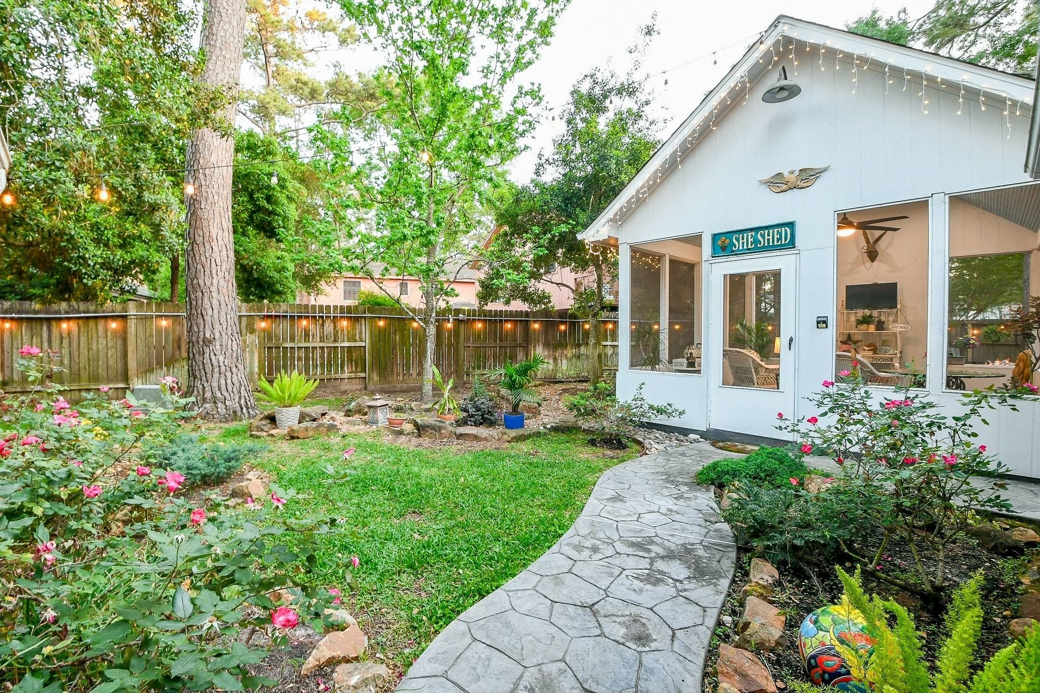 6607 Misty Springs Lane Spring, TX 77379 - Photo 23 of 31 Experience ultimate relaxation and entertainment in your private backyard She Shed.