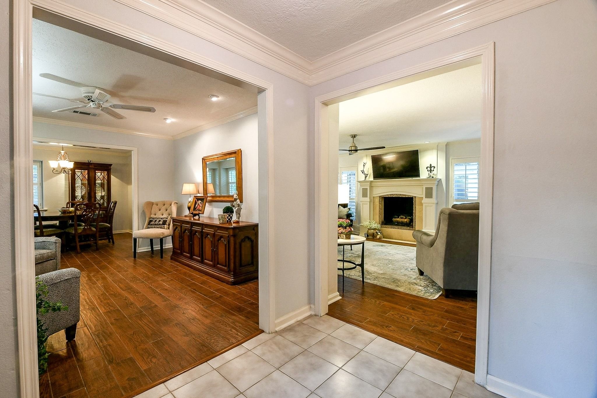 6607 Misty Springs Lane Spring, TX 77379 - Photo 5 of 31 Experience cozy evenings by the elegant family room fireplace with convenient gas logs.