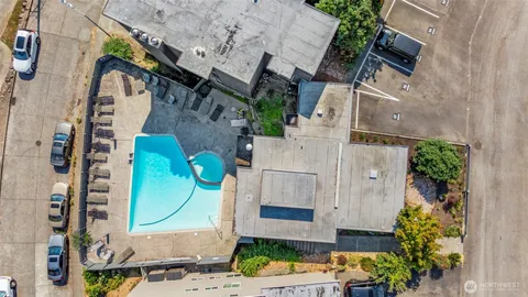 an aerial view of a fireplace with sitting space