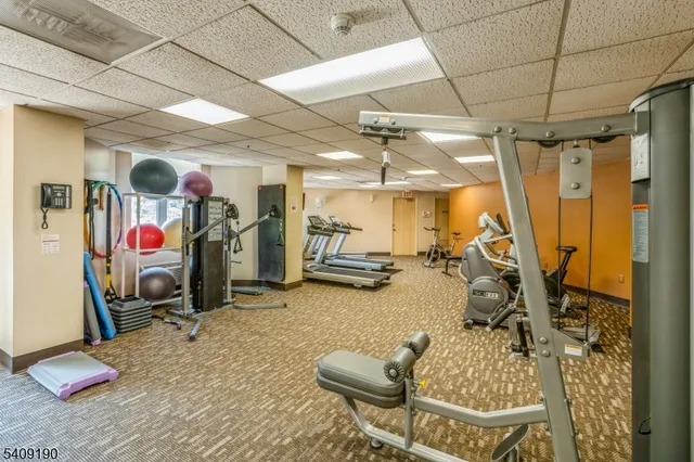 an aerial view of a house with outdoor space and lake view