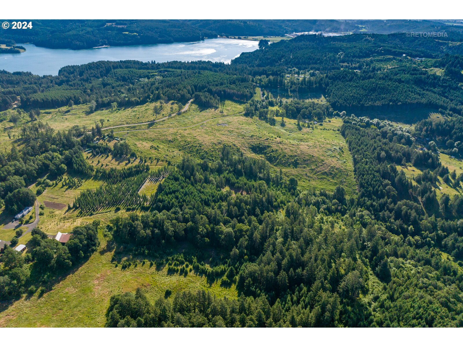 Roberts School Road Gaston, OR 97119 - Photo 37 of 37 a view of a lush green hillside and houses