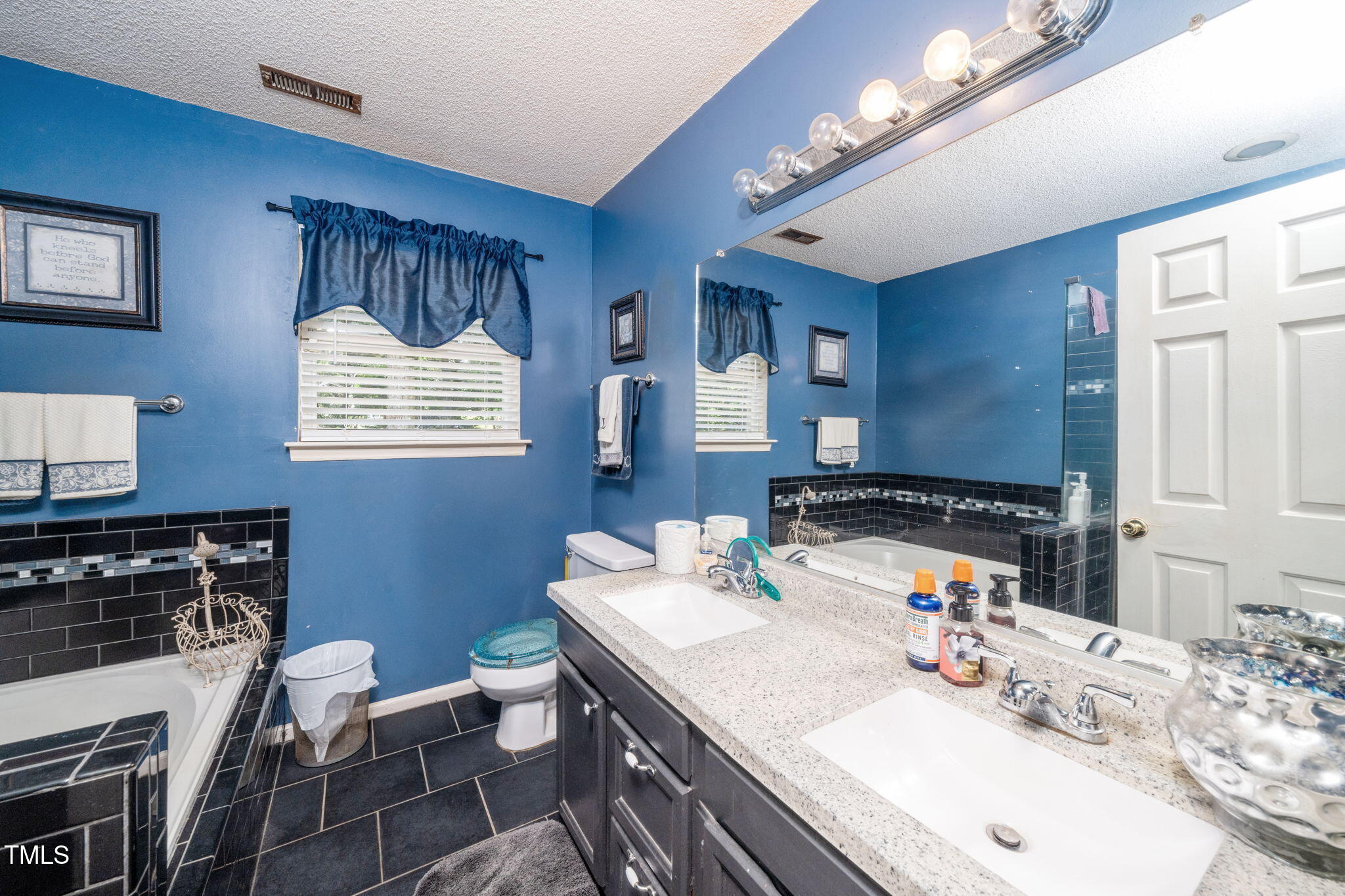 501 Dandelion Court Raleigh, NC 27610 - Photo 16 of 27 Primary Bathroom