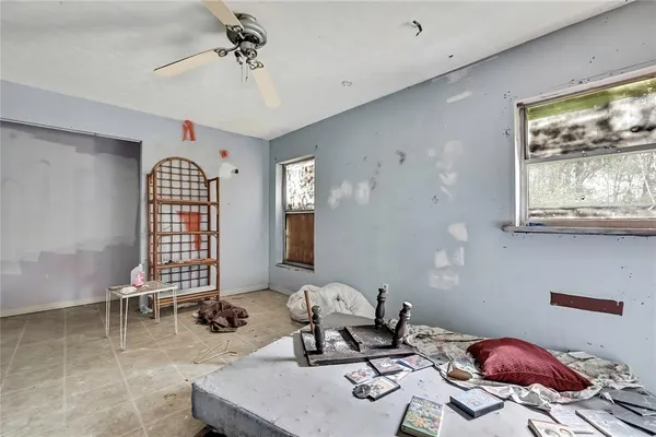 a living room with furniture and a window