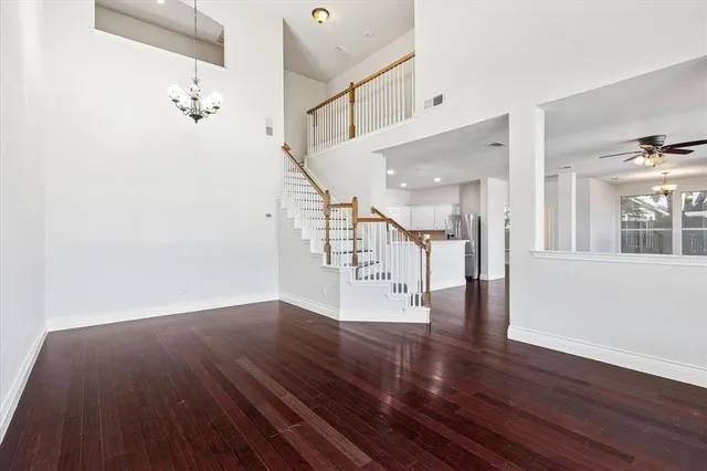 a view of an entryway with wooden floor