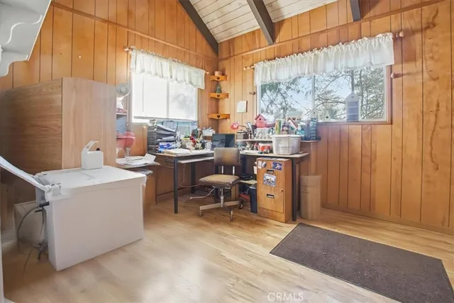 a view of living room filled with furniture and furniture