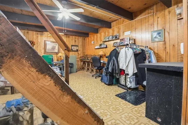 a view of a deck with wooden floor and seating space