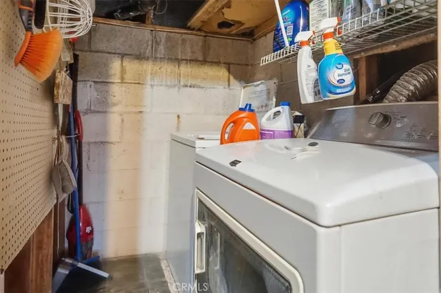 a balcony with wooden floor and fence