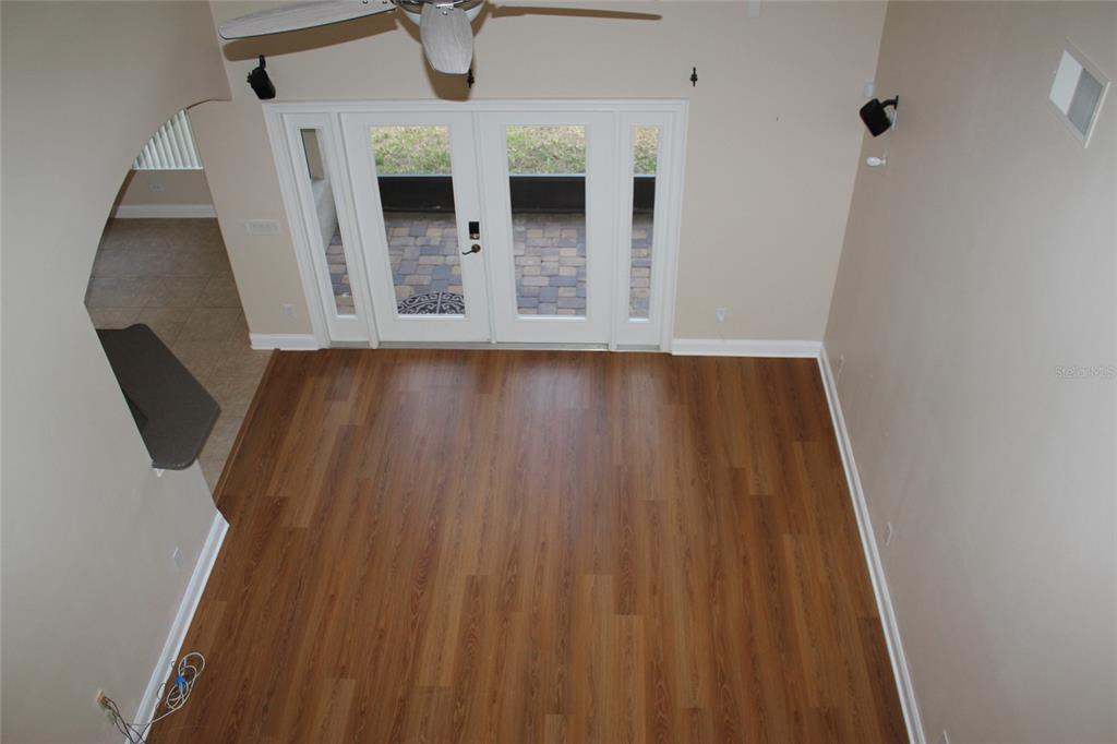 6833 Dolce Way Orlando, FL 32819 - Photo 19 of 28 a view of entryway with wooden floor
