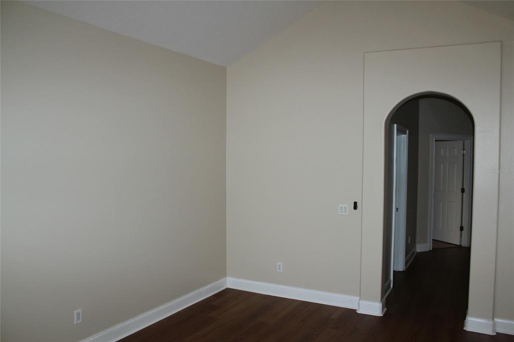 6833 Dolce Way Orlando, FL 32819 - Photo 22 of 28 a room with a door