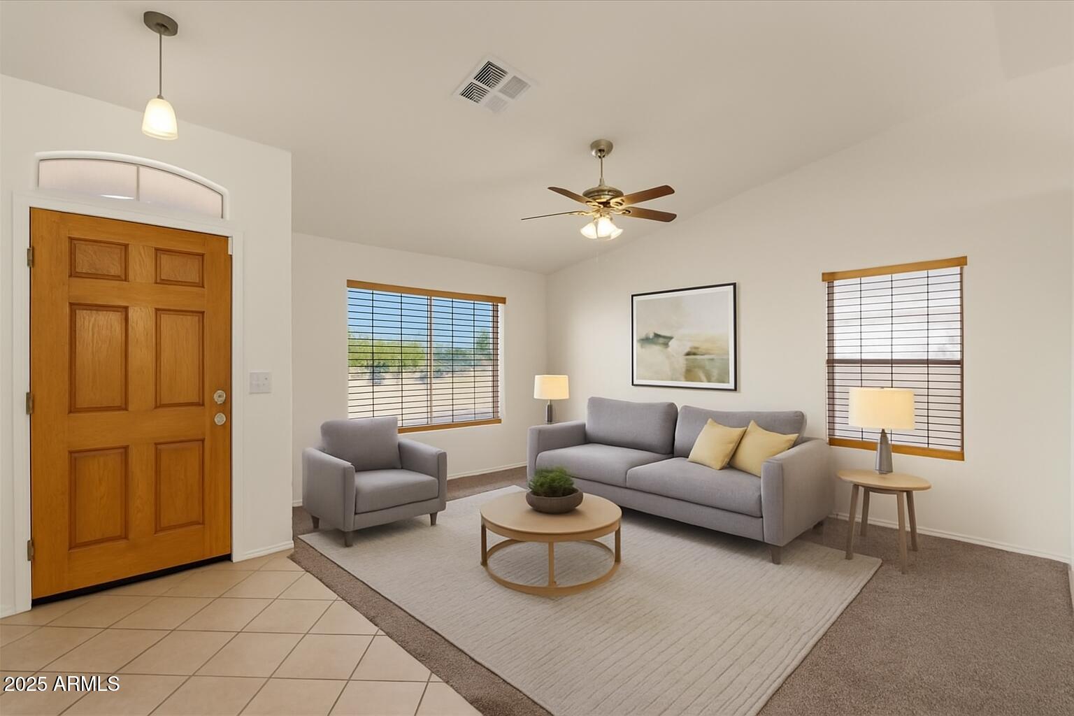 9163 West St John Road Peoria, AZ 85382 - Photo 5 of 38 a living room with furniture and a window