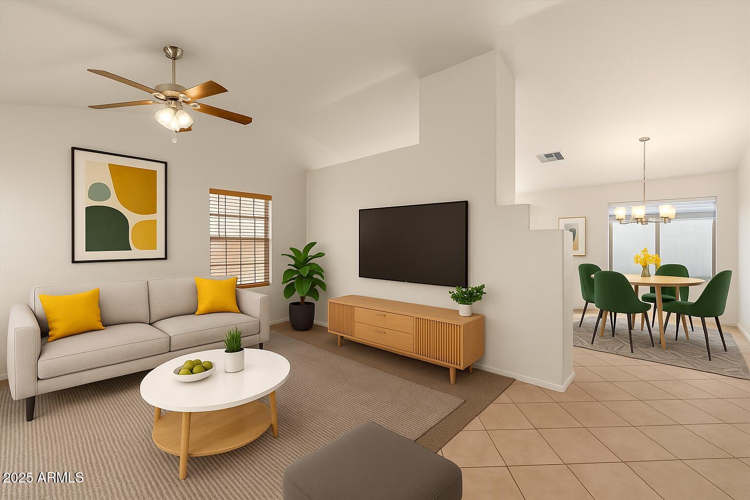 9163 West St John Road Peoria, AZ 85382 - Photo 7 of 38 a living room with furniture a rug and a flat screen tv