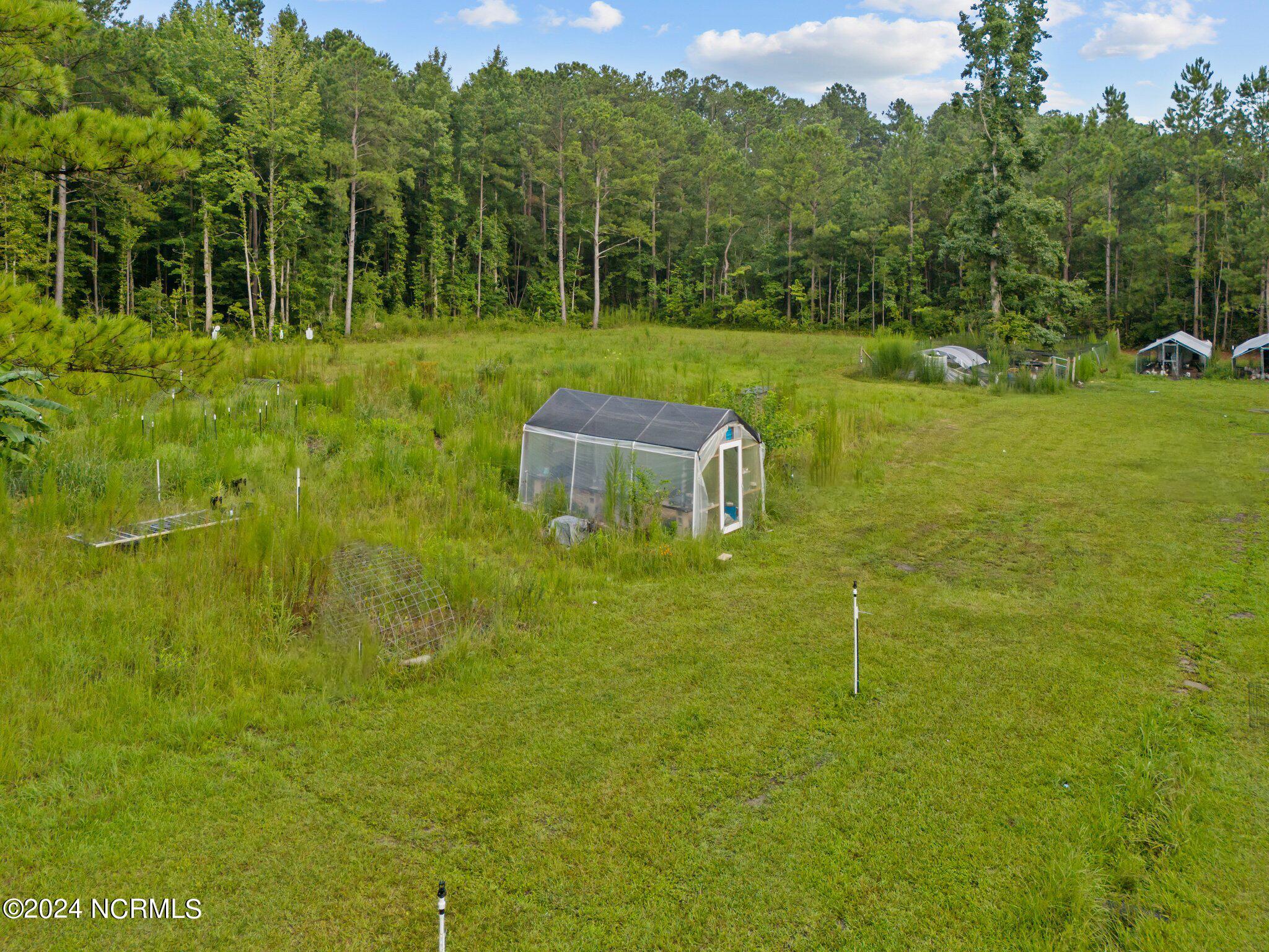 959 Kel Ash Road Rocky Point, NC 28457 - Photo 36 of 59 56-web-or-mls-DJI_20240729184559_0130_D