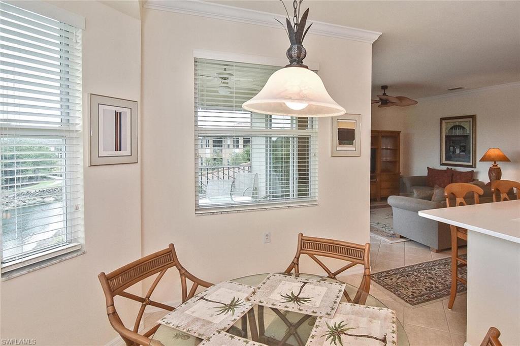 3830 Sawgrass Way, Unit 2946 Naples, FL 34112 - Photo 23 of 49 a view of a livingroom with furniture and window