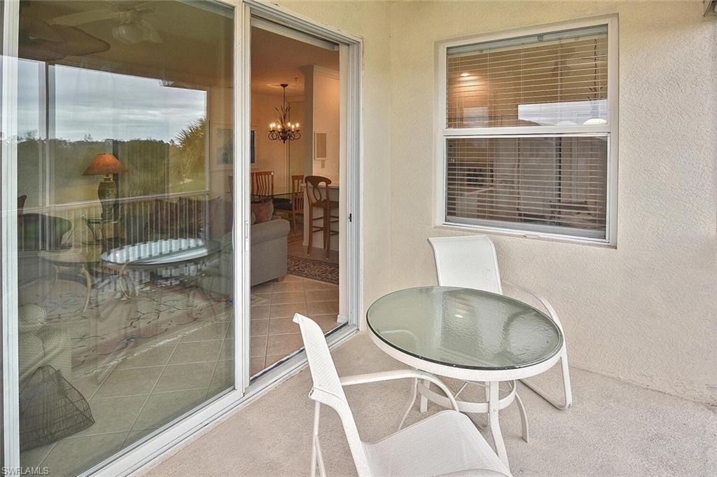 3830 Sawgrass Way, Unit 2946 Naples, FL 34112 - Photo 38 of 49 a bathroom with a sink toilet and shower