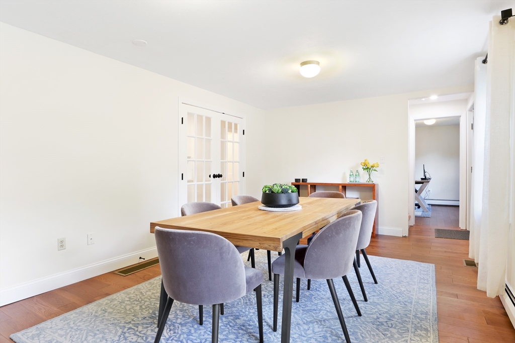 247 Greendale Avenue Needham, MA 02494 - Photo 11 of 33 a view of a dining room with furniture and wooden floor