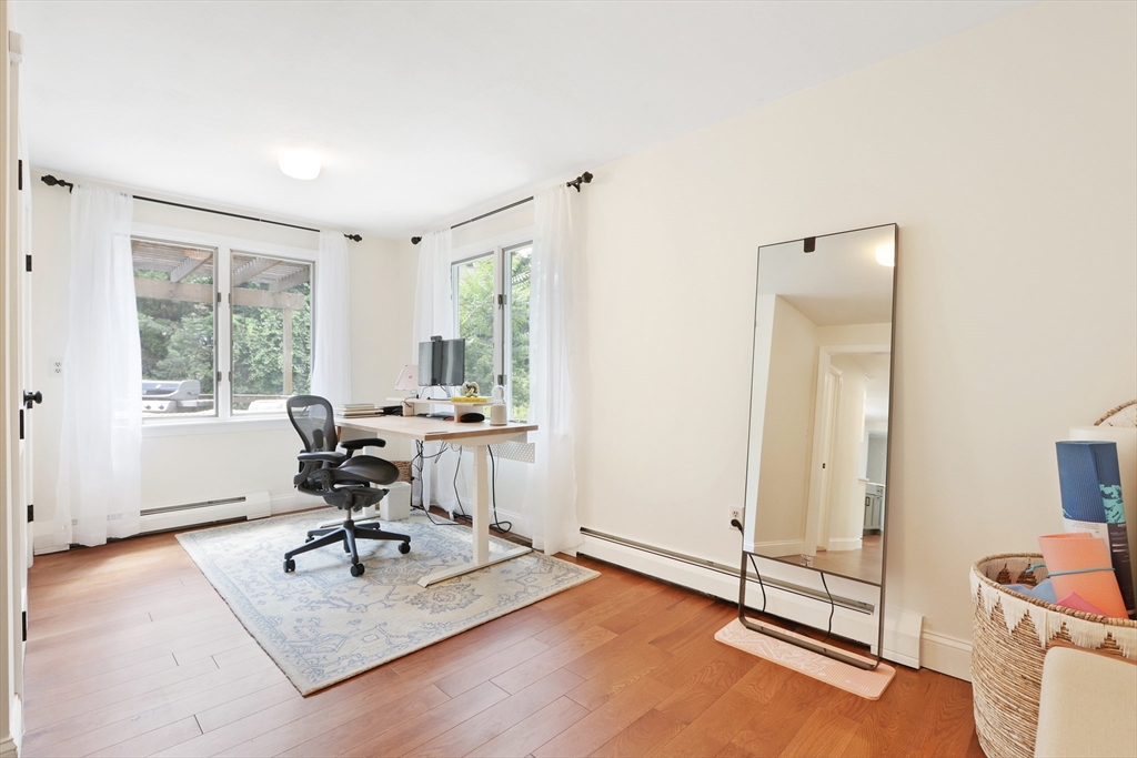 247 Greendale Avenue Needham, MA 02494 - Photo 13 of 33 a view of a workspace with furniture and a window