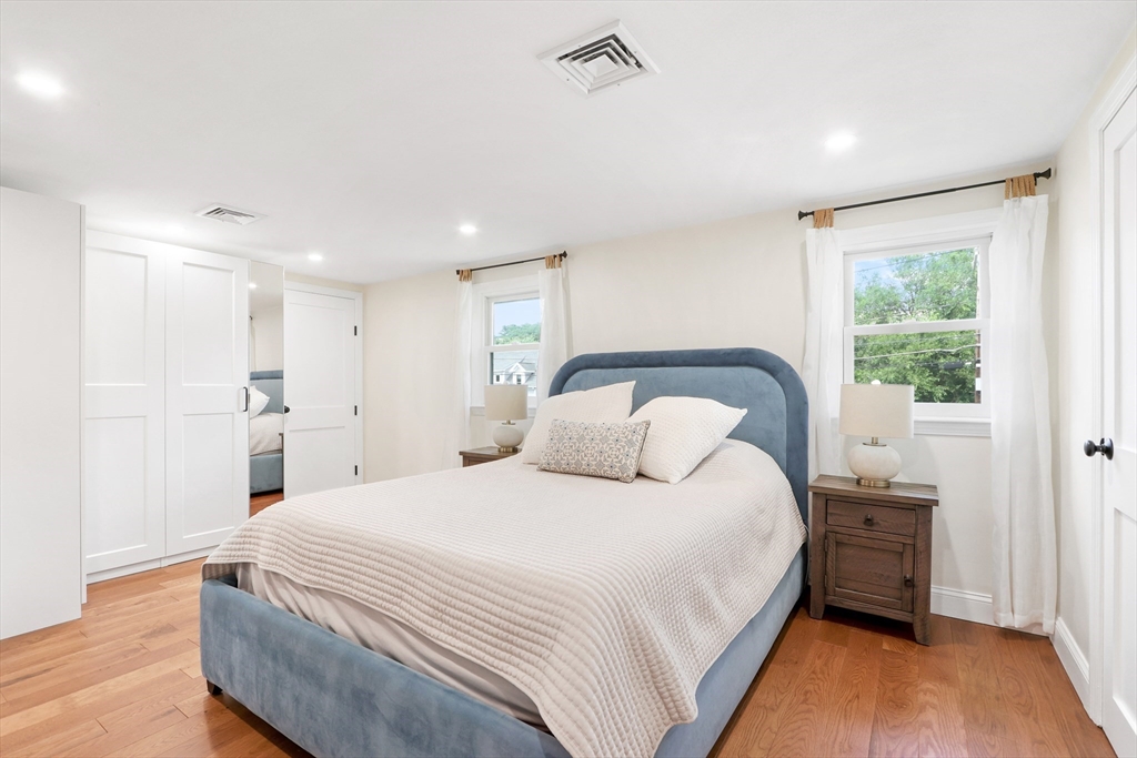 247 Greendale Avenue Needham, MA 02494 - Photo 16 of 33 a bedroom with a bed and a window