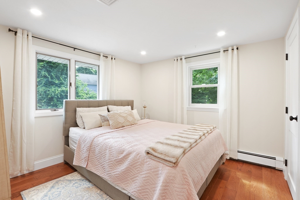 247 Greendale Avenue Needham, MA 02494 - Photo 20 of 33 a bedroom with a bed and a window