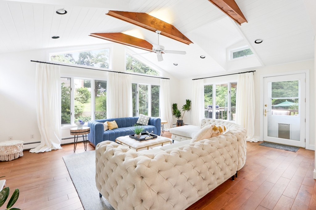 247 Greendale Avenue Needham, MA 02494 - Photo 2 of 33 a living room with furniture and large windows