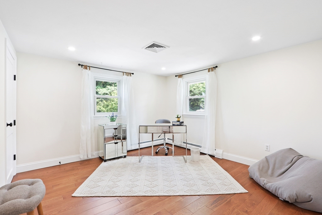 247 Greendale Avenue Needham, MA 02494 - Photo 24 of 33 a living room with furniture and a window