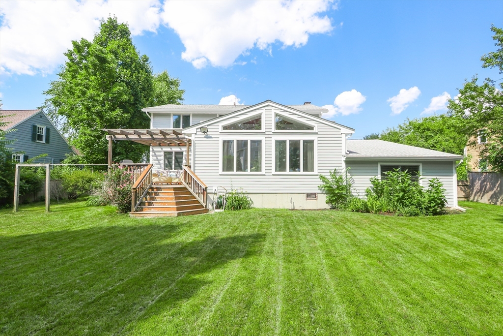 247 Greendale Avenue Needham, MA 02494 - Photo 26 of 33 a view of a house with a yard and sitting area