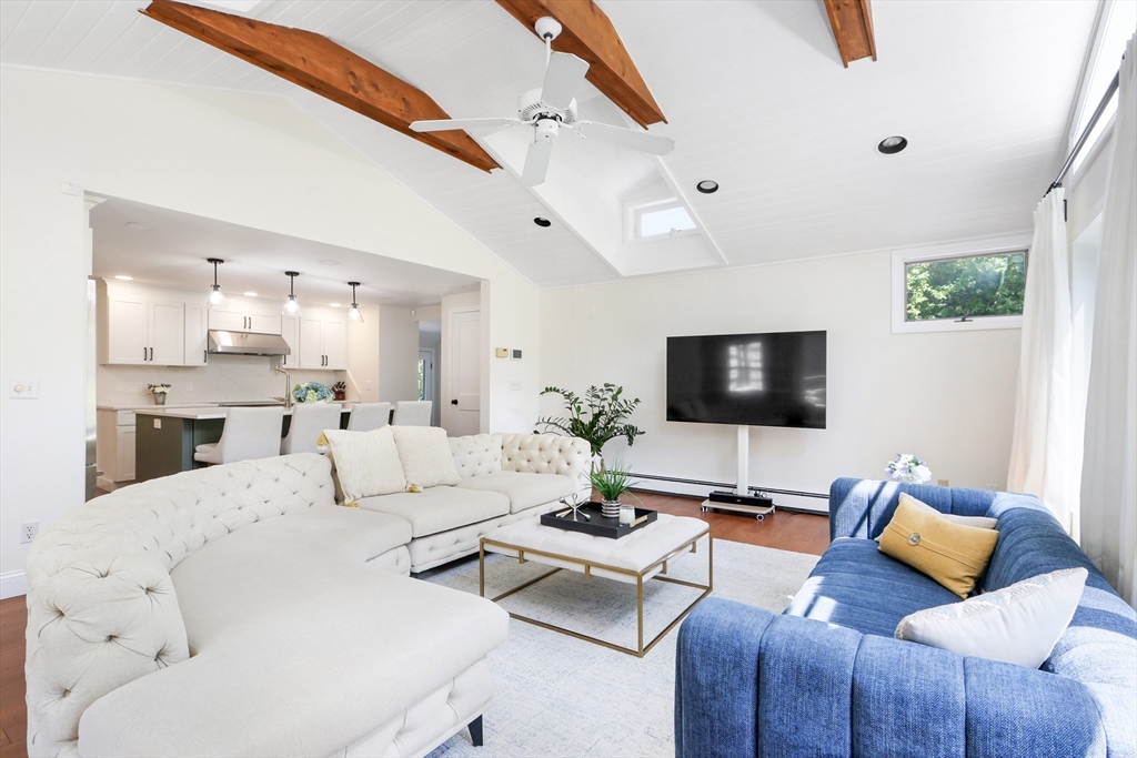 247 Greendale Avenue Needham, MA 02494 - Photo 3 of 33 a living room with furniture and a flat screen tv