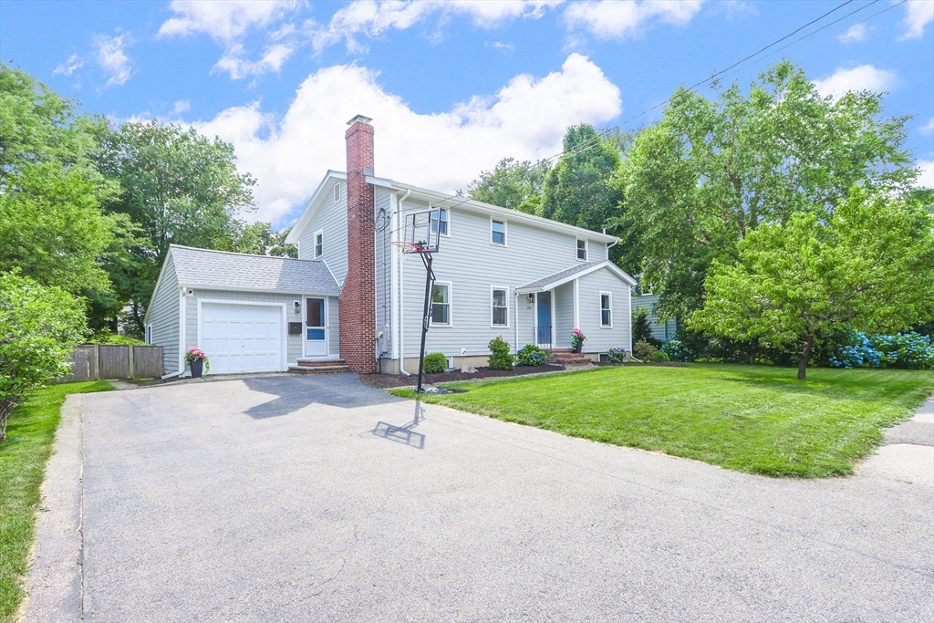 247 Greendale Avenue Needham, MA 02494 - Photo 31 of 33 a house view with a backyard space