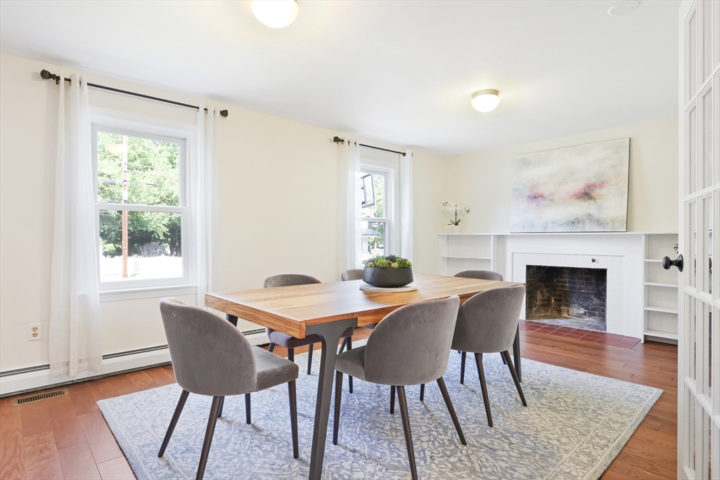 247 Greendale Avenue Needham, MA 02494 - Photo 9 of 33 a view of a dining room with furniture and wooden floor