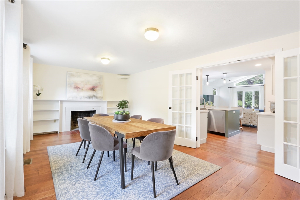 247 Greendale Avenue Needham, MA 02494 - Photo 10 of 33 a view of a dining room with furniture and wooden floor