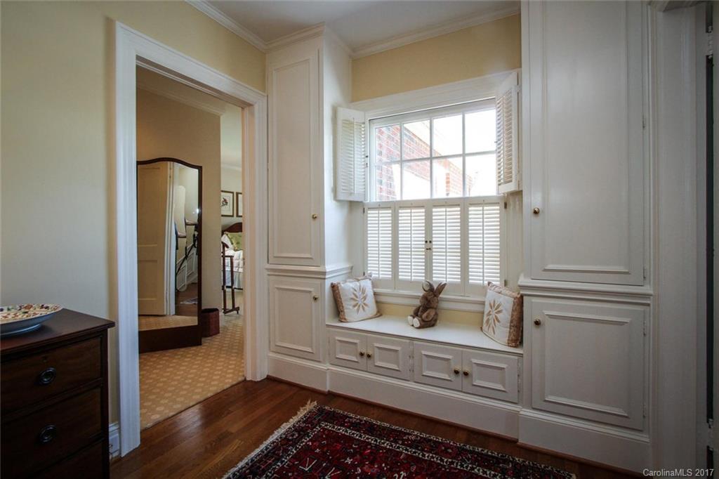 1245 Providence Road Charlotte, NC 28207 - Photo 14 of 24 a bathroom with a window and a shower