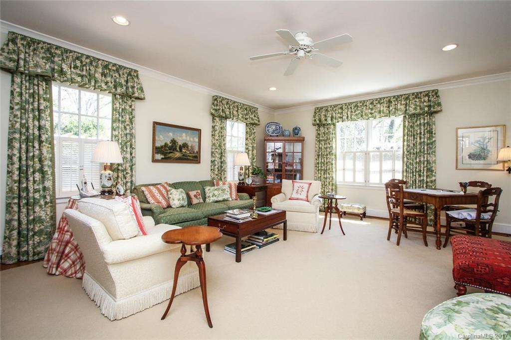 1245 Providence Road Charlotte, NC 28207 - Photo 6 of 24 a living room with furniture and a large window