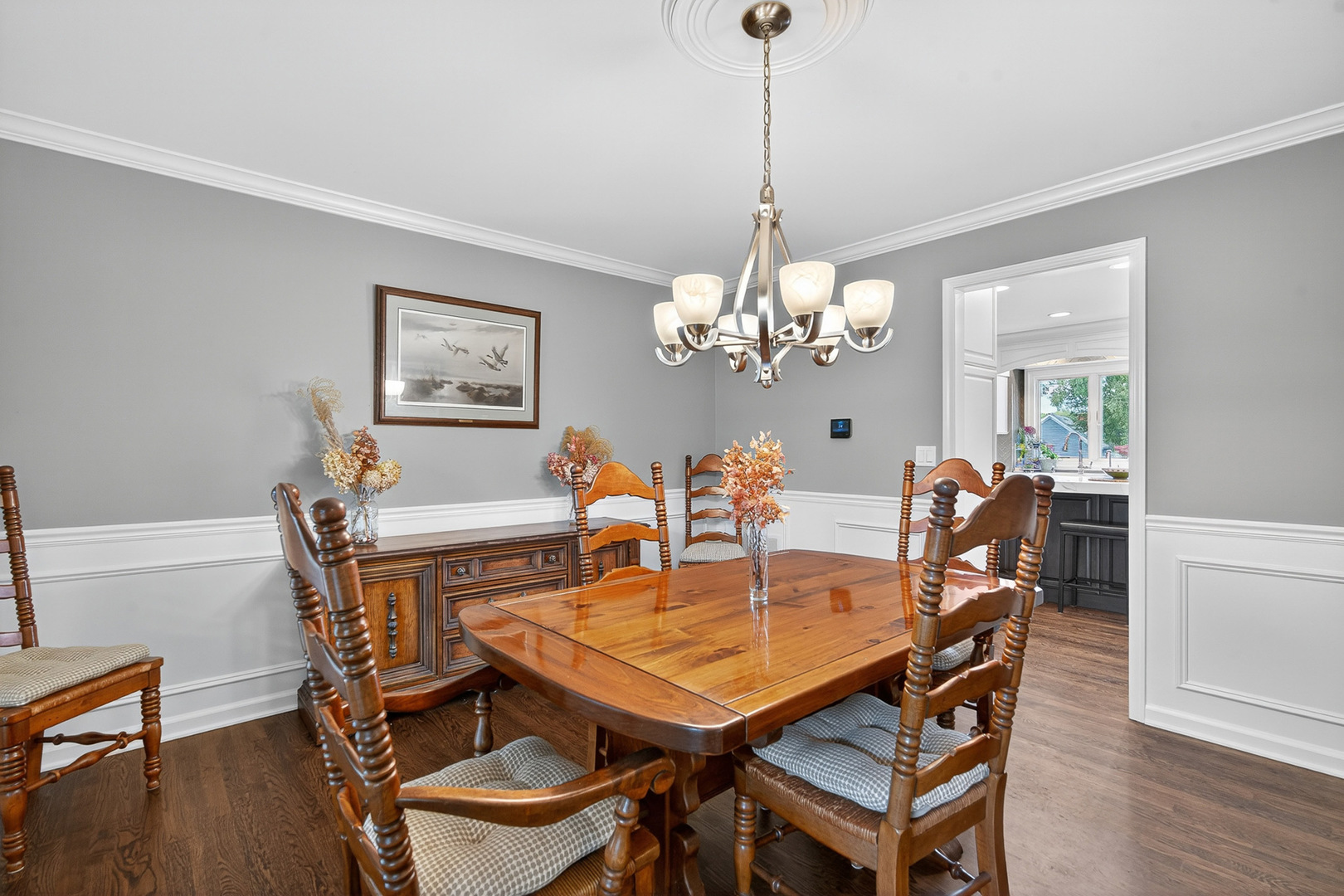 20633 North Primrose Court Deer Park, IL 60010 - Photo 15 of 43 a view of a dining room with furniture wooden floor and chandelier