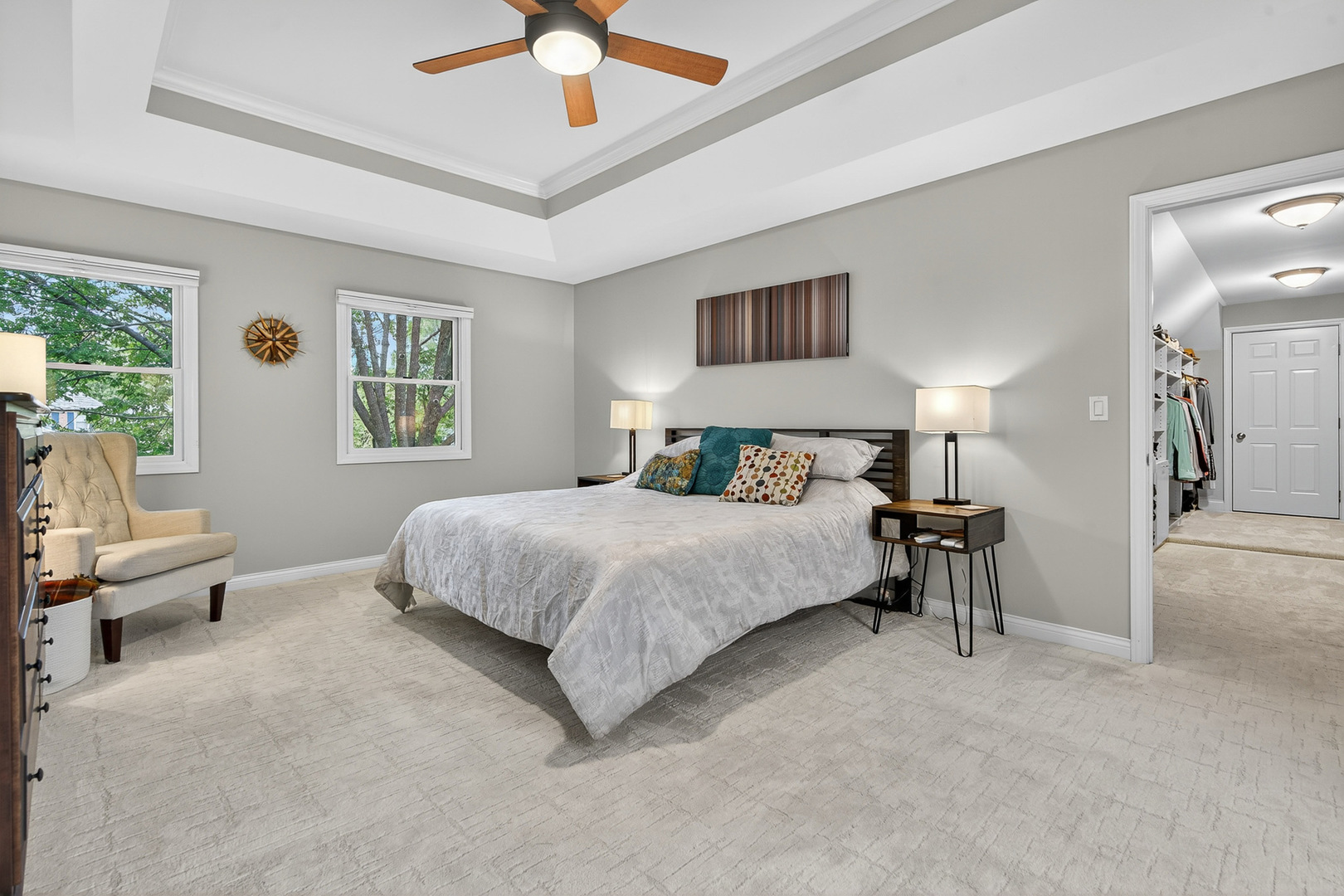 20633 North Primrose Court Deer Park, IL 60010 - Photo 18 of 43 a spacious bedroom with a bed a couch and a window