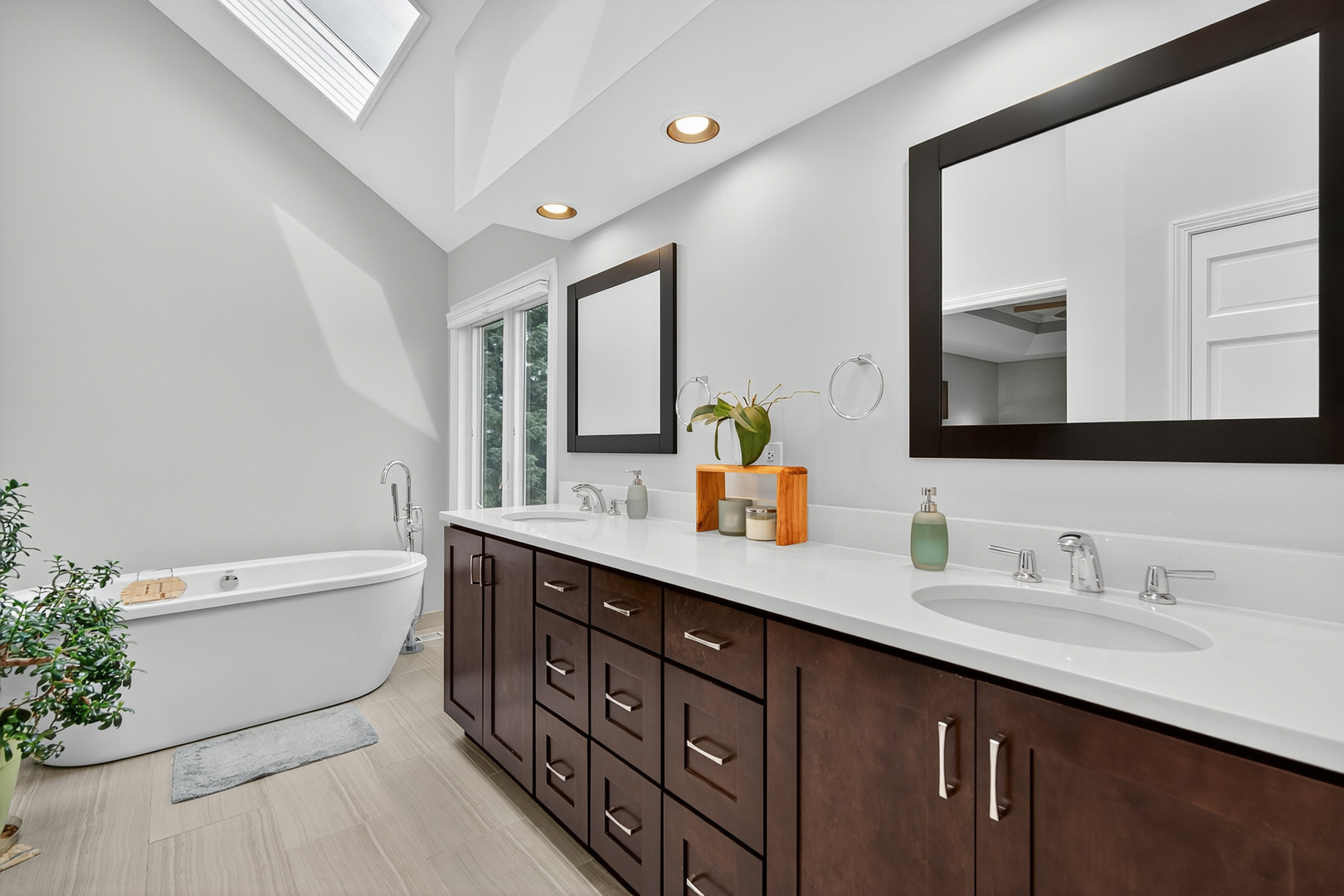 20633 North Primrose Court Deer Park, IL 60010 - Photo 21 of 43 a spacious bathroom with a double vanity sink a mirror and a bathtub
