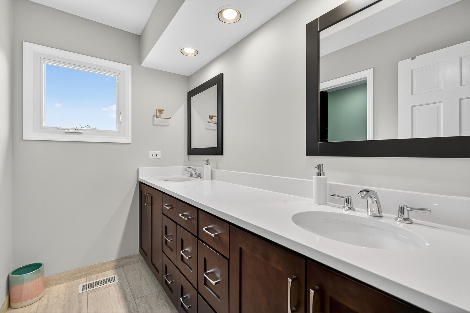 20633 North Primrose Court Deer Park, IL 60010 - Photo 27 of 43 a bathroom with a double vanity sink and a mirror