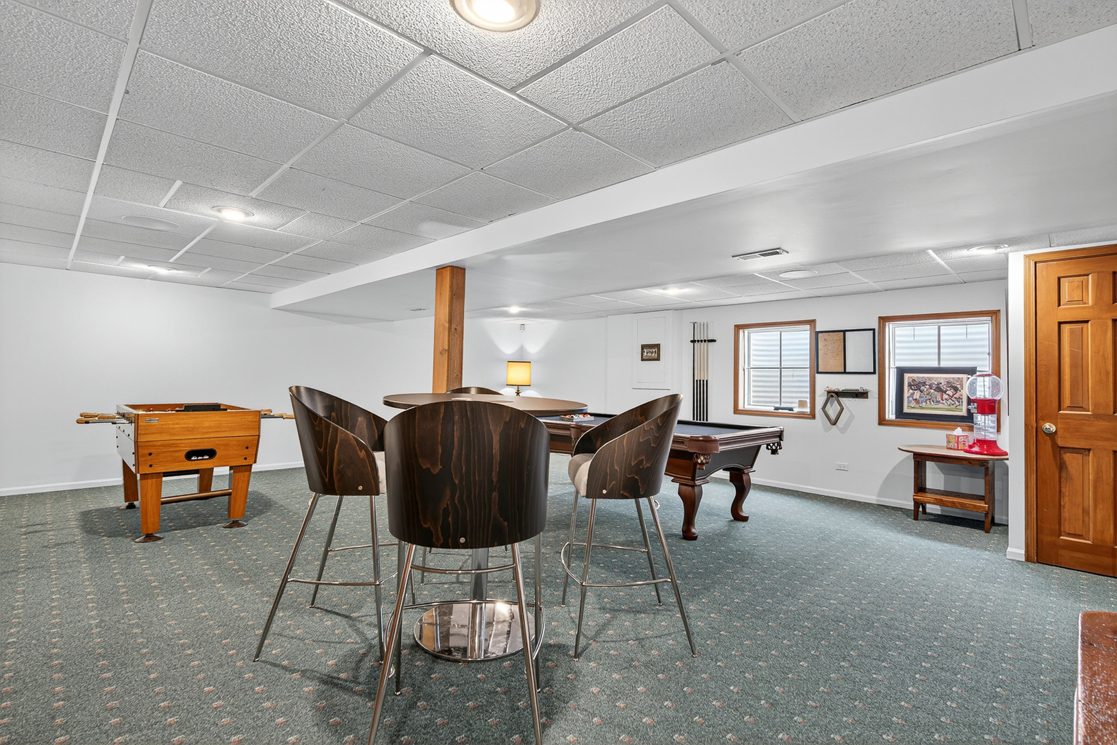 20633 North Primrose Court Deer Park, IL 60010 - Photo 30 of 43 a living room with furniture a flat screen tv and a table
