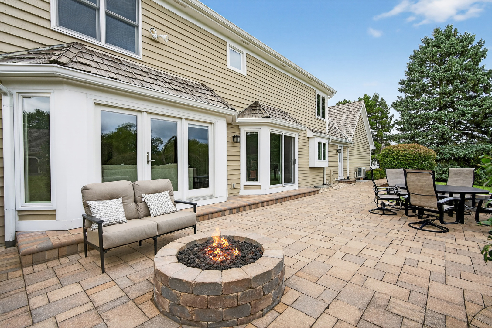 20633 North Primrose Court Deer Park, IL 60010 - Photo 34 of 43 a view of a patio with a couple of chairs in front of house
