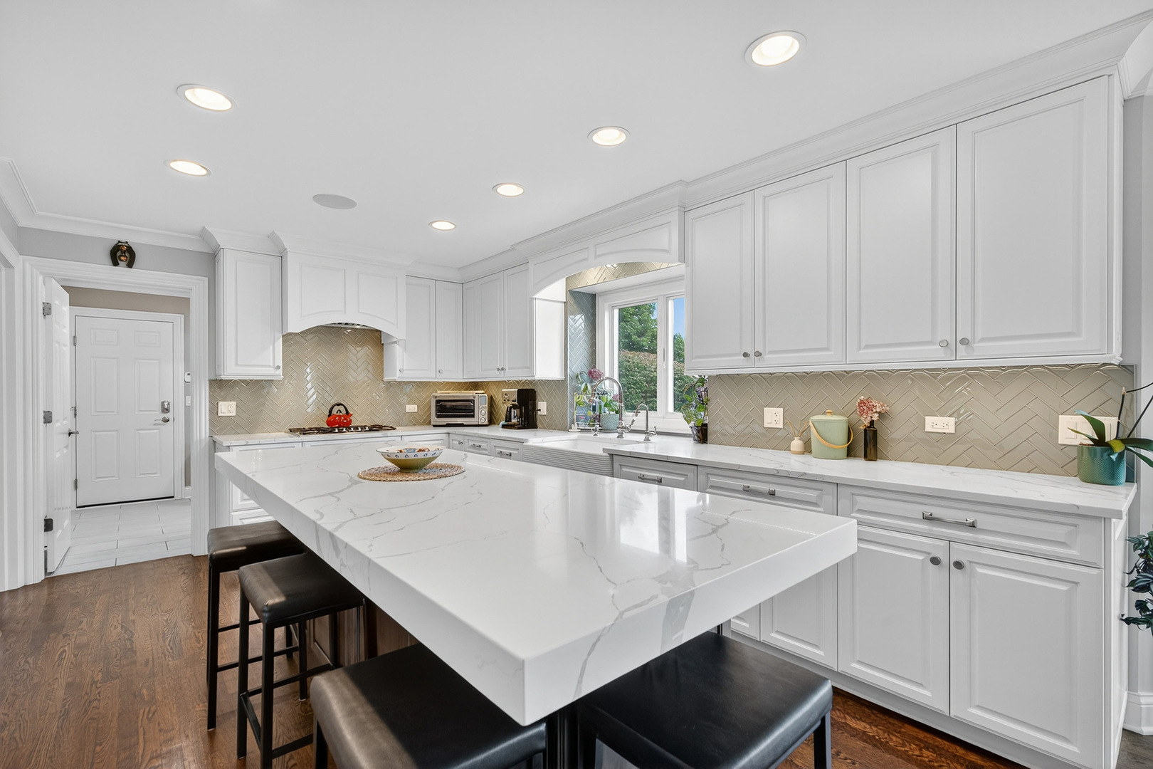 20633 North Primrose Court Deer Park, IL 60010 - Photo 8 of 43 a large white kitchen with sink and cabinets