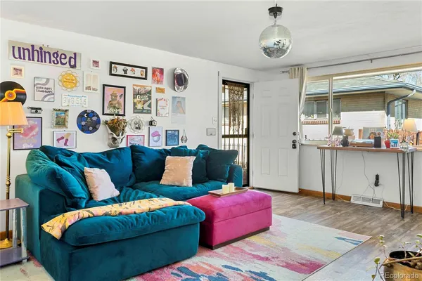 a living room with furniture and a table