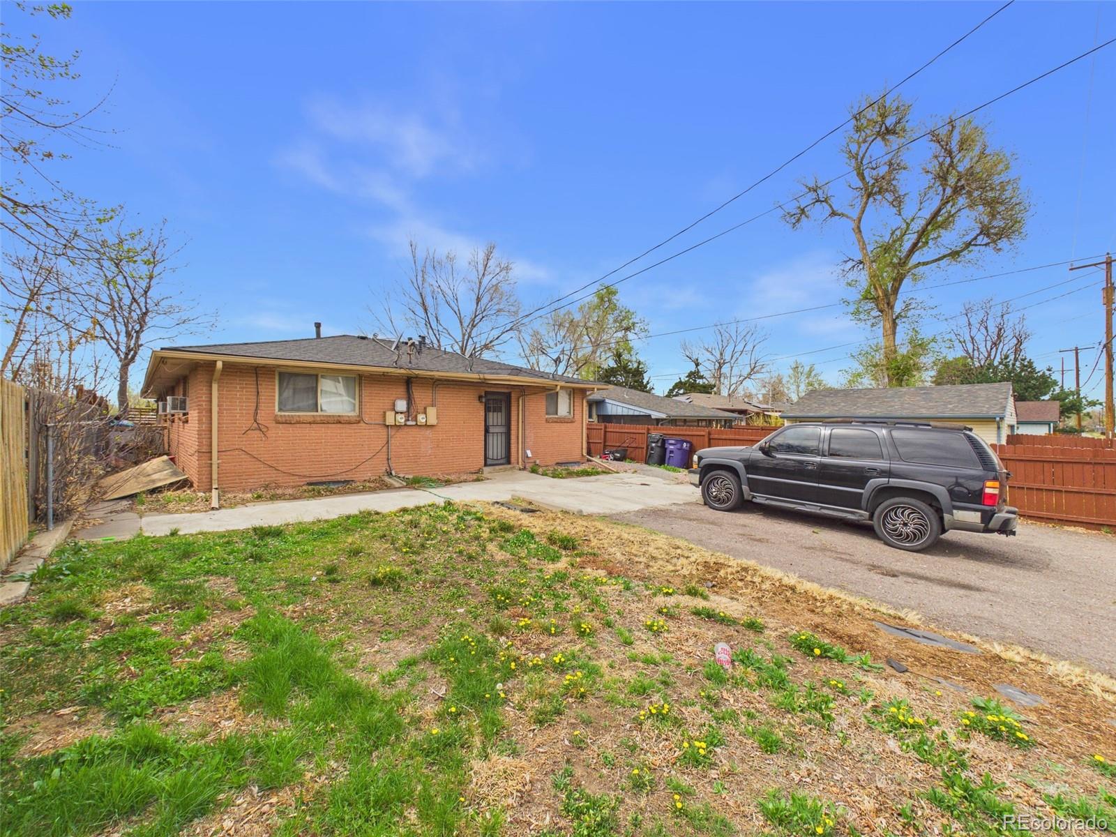 3358 Pontiac Street Denver, CO 80207 - Photo 21 of 26 a view of a yard in front of a house