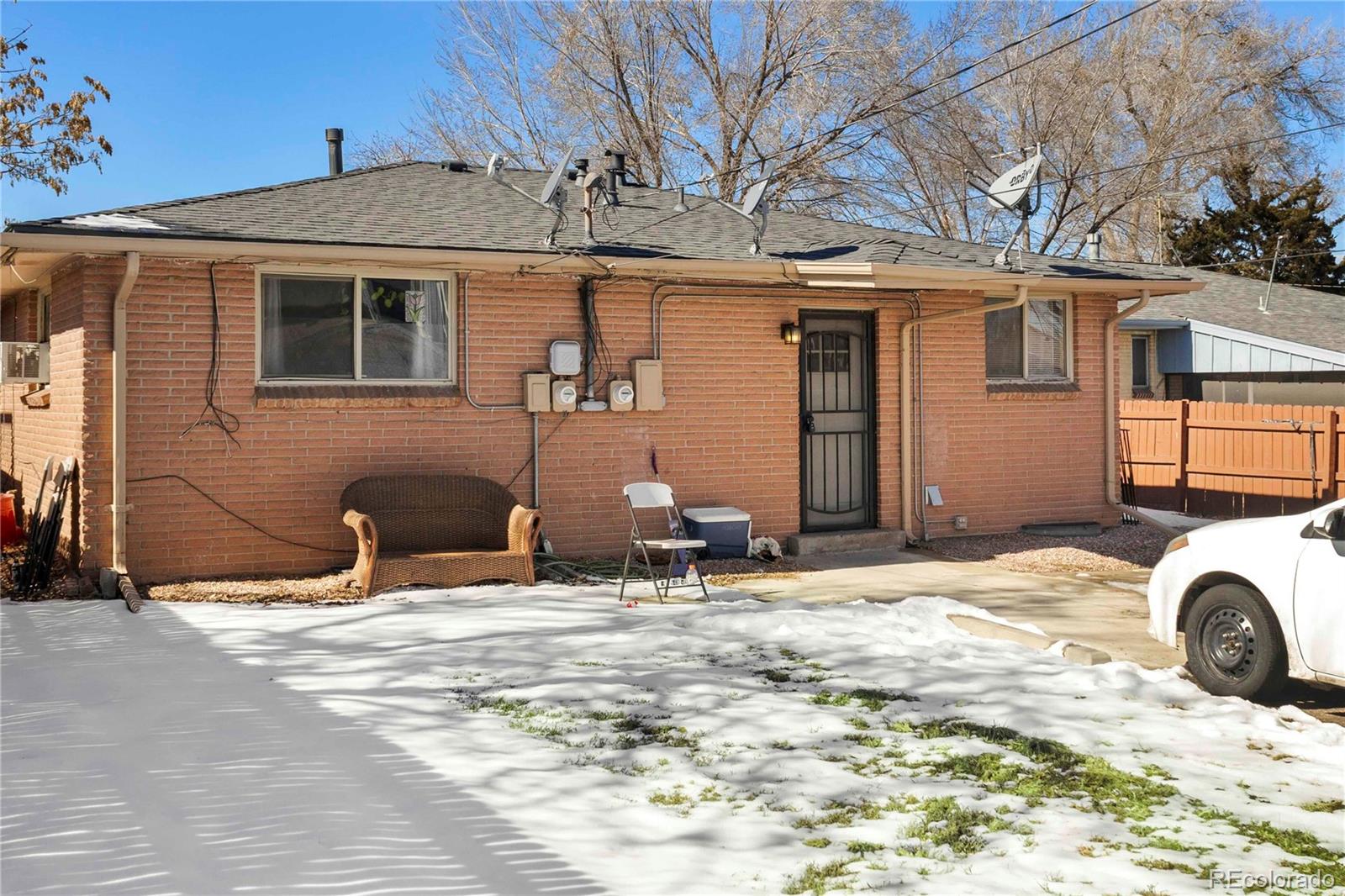 3358 Pontiac Street Denver, CO 80207 - Photo 25 of 26 a view of a house with a patio