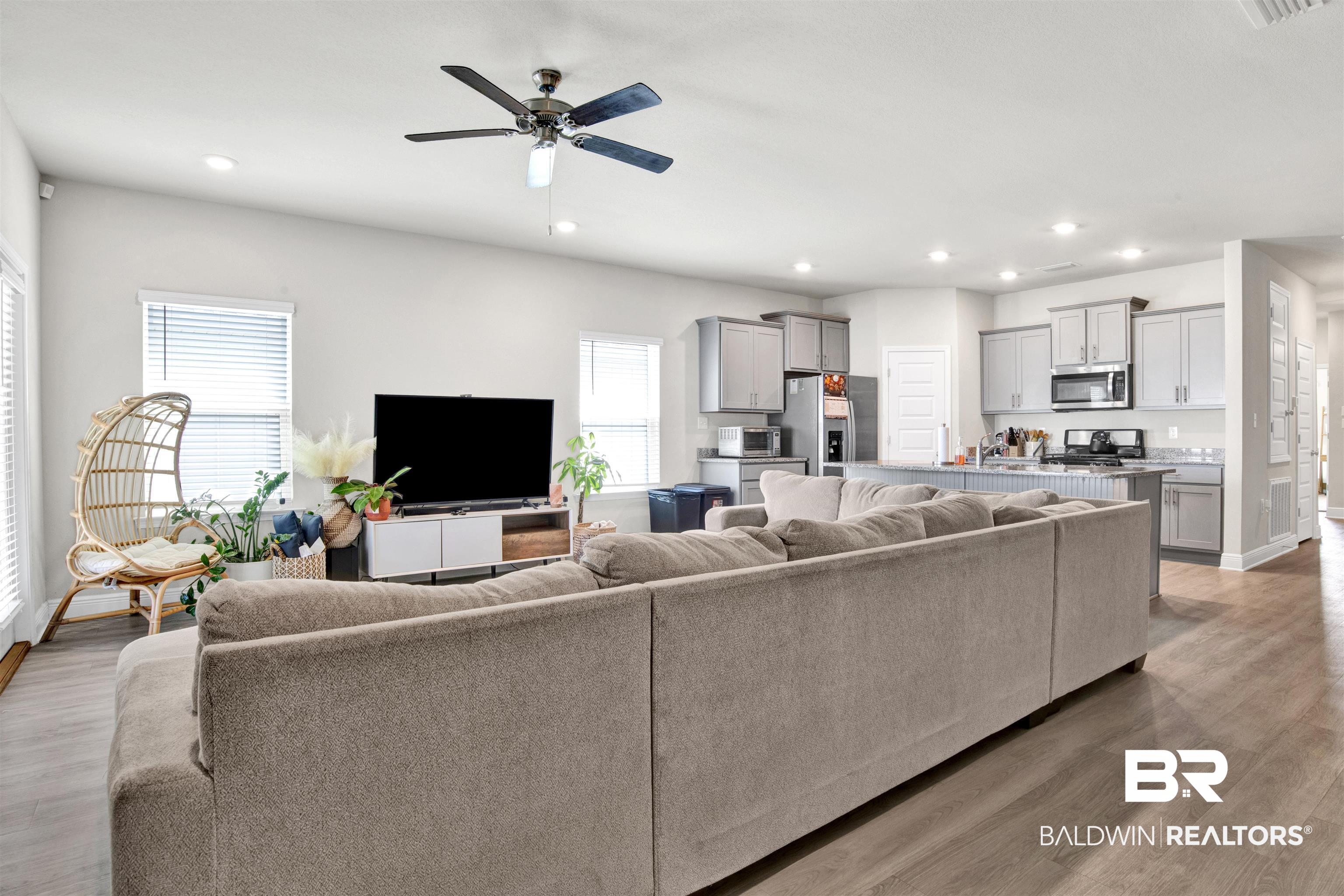 24253 Alydar Loop Daphne, AL 36526 - Photo 11 of 44 Living room with ceiling fan, light wood-type flooring, recessed lighting, and healthy amount of natural light