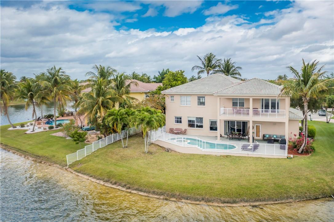 4185 Southwest 186th Way Miramar, FL 33029 - Photo 14 of 92 a view of a house with swimming pool and sitting area