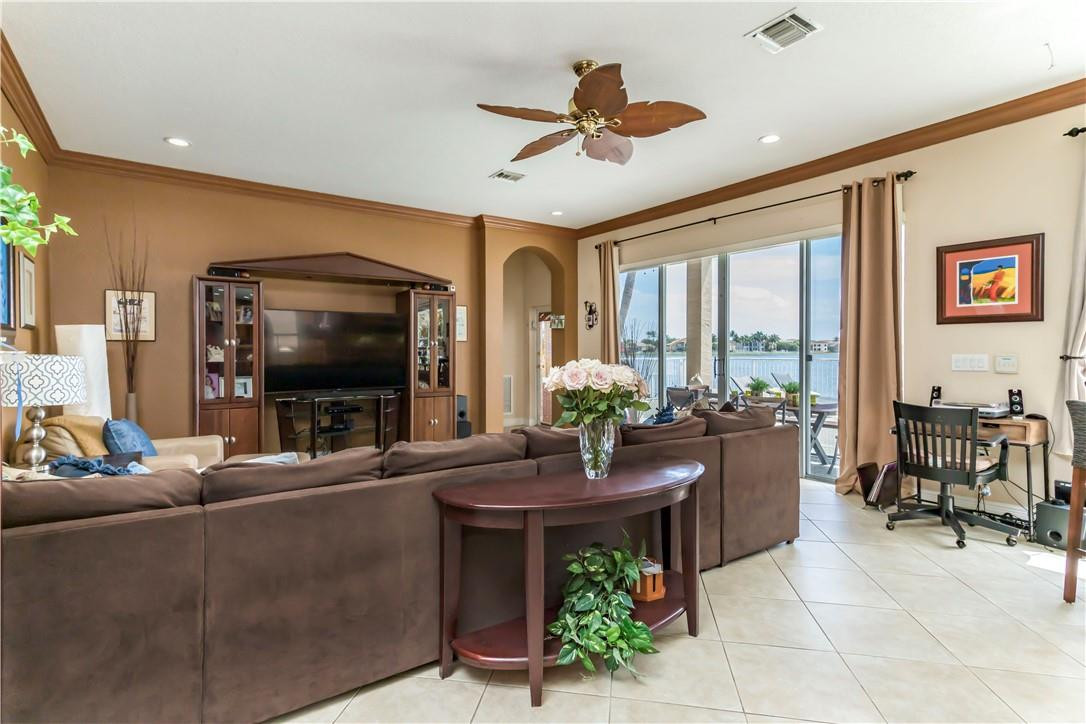 4185 Southwest 186th Way Miramar, FL 33029 - Photo 28 of 92 a living room with furniture a flat screen tv and a large window